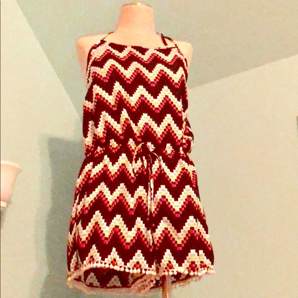 NWT boutique tie neck romper with pom-pom trim - L